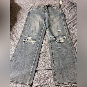 Distressed Light Blue Jeans
